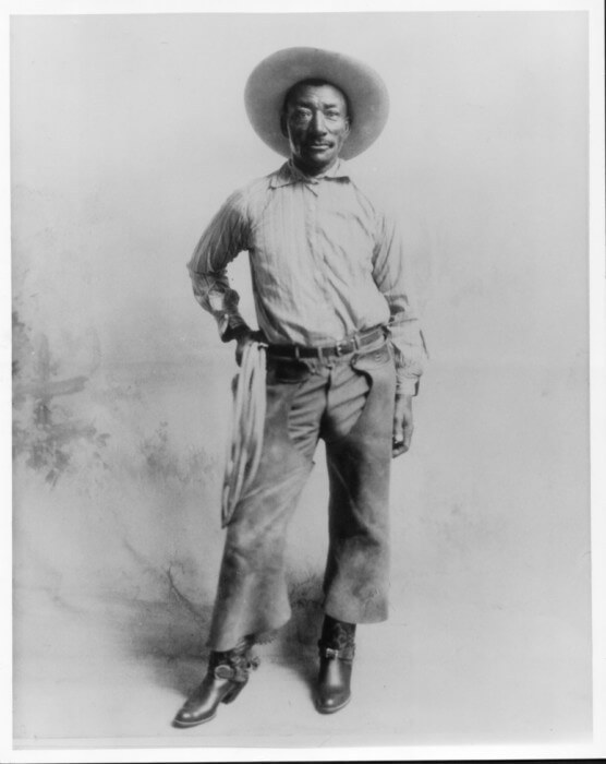 Archival photo of Black cowboy and rodeo star, Bill Picket.