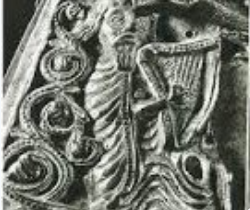 Depiction of an Irish harpist in the 11th century from the Breac Maodhóg reliquary.