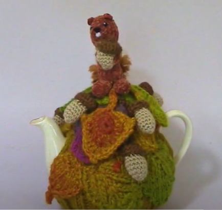 Image of a tea cozy by Athens County Knitters.
