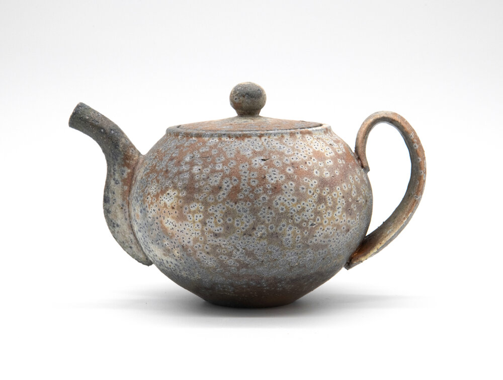 Image of ceramic teapot made by our featured artist, Stuart Gair.