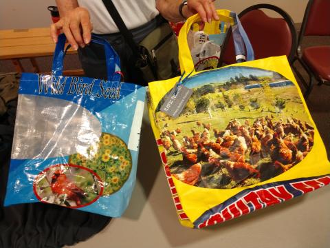 A picture of two reusable totes made from feed bags