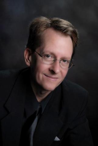 Formal headshot of Dr. Keith Dippre