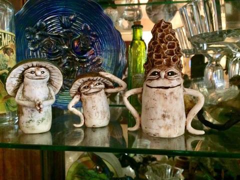 Assorted figures and vessels by featured artist, Kelly Lawrence.