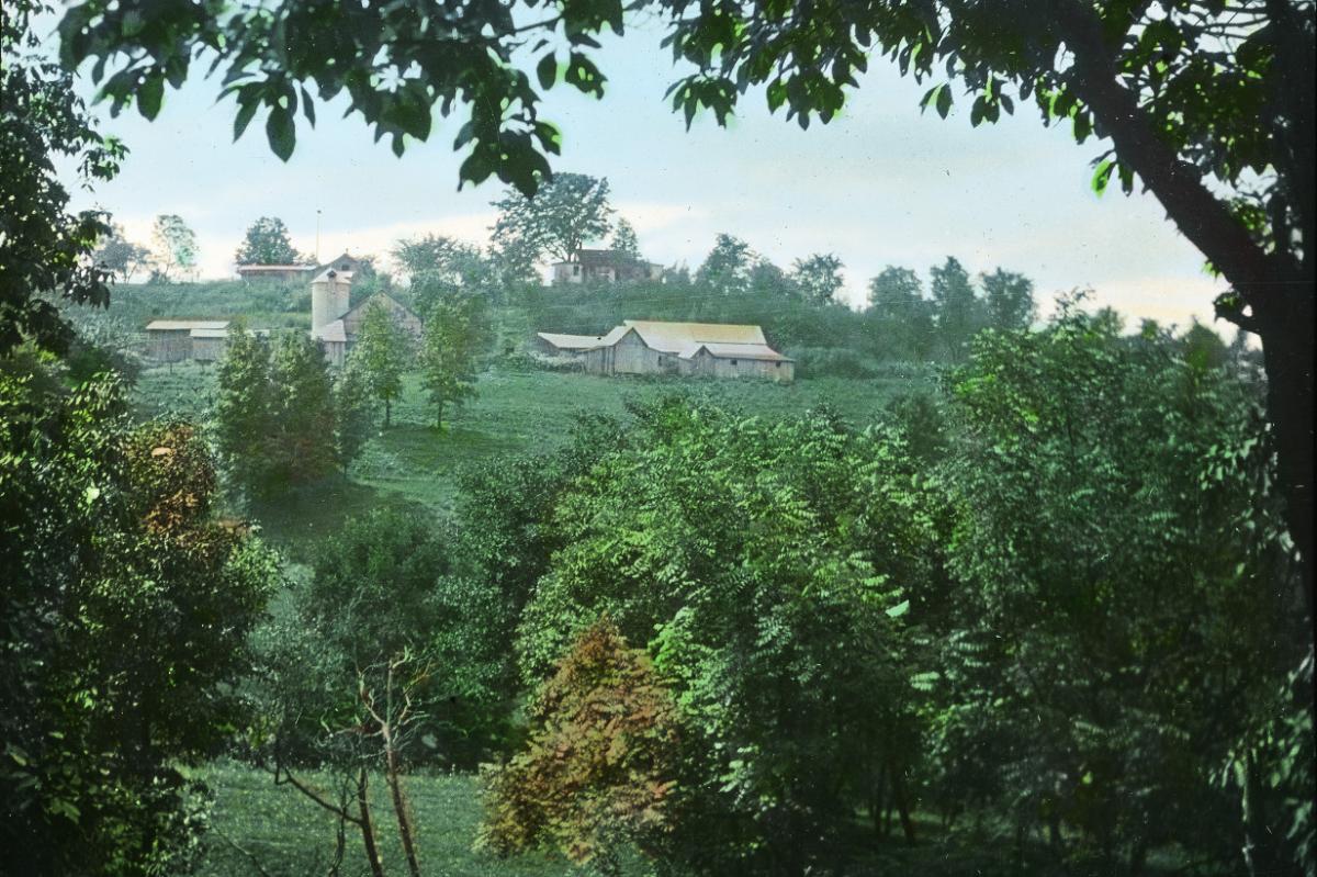 Vintage tinted photo of an Athens County farm from a century ago.