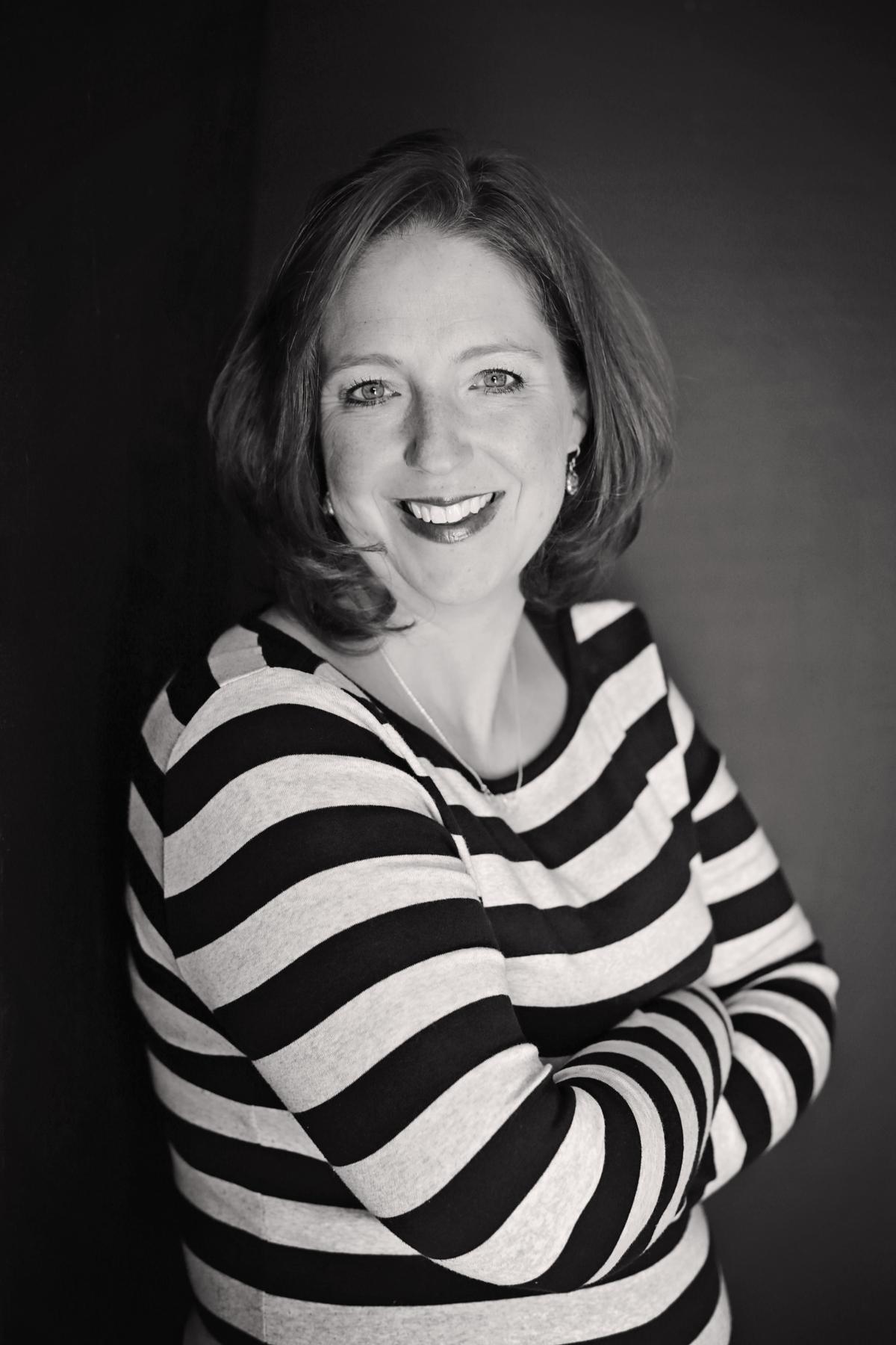 Black and white headshot of event presenter Aubrei Krummert