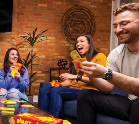 People having fun playing a card game