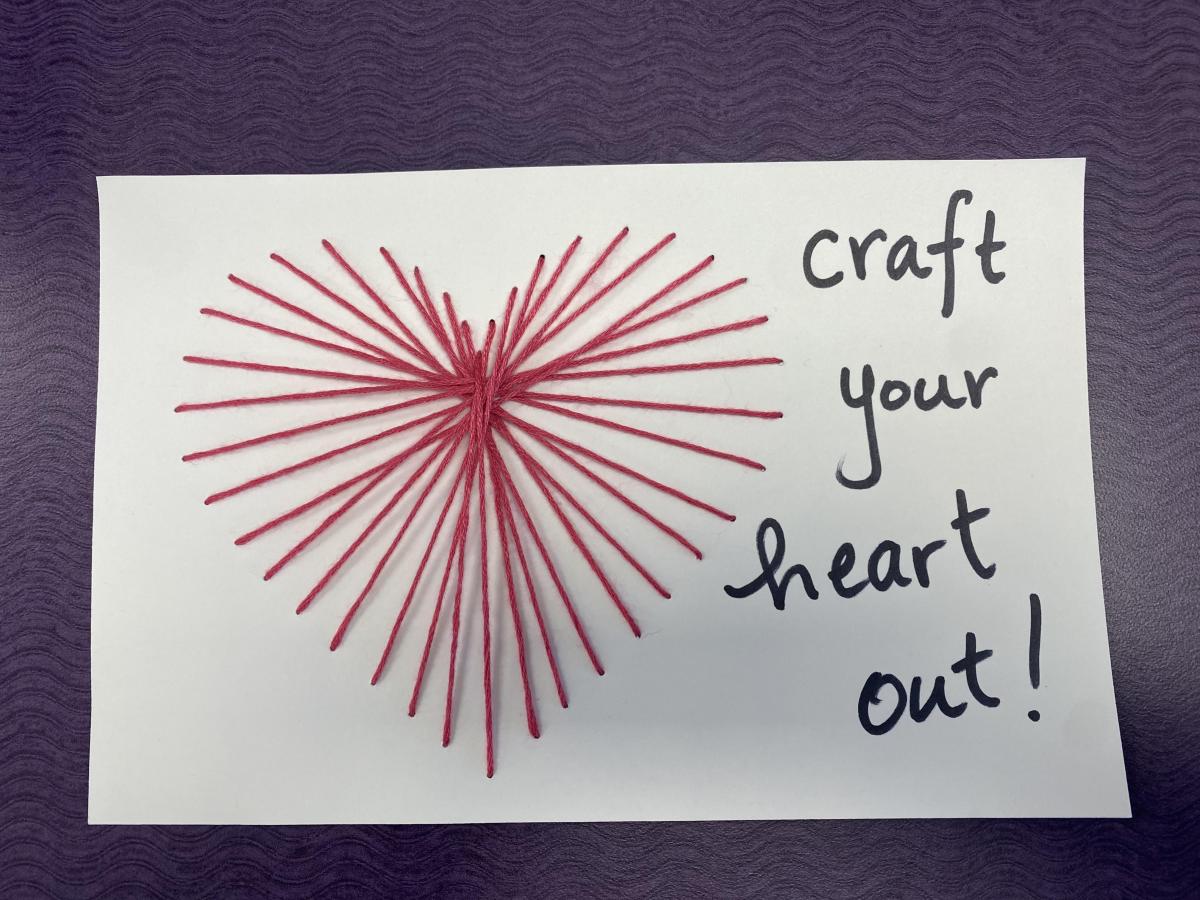 Heart Made With Yarn Weaved On Paper